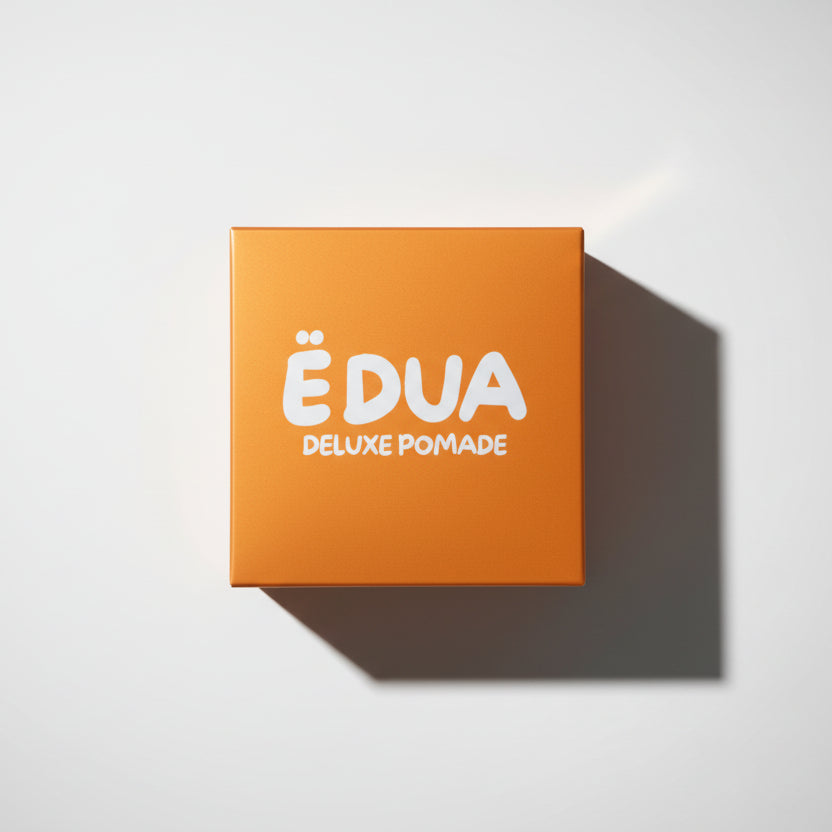 Orange box of E'DUA Deluxe Pomade